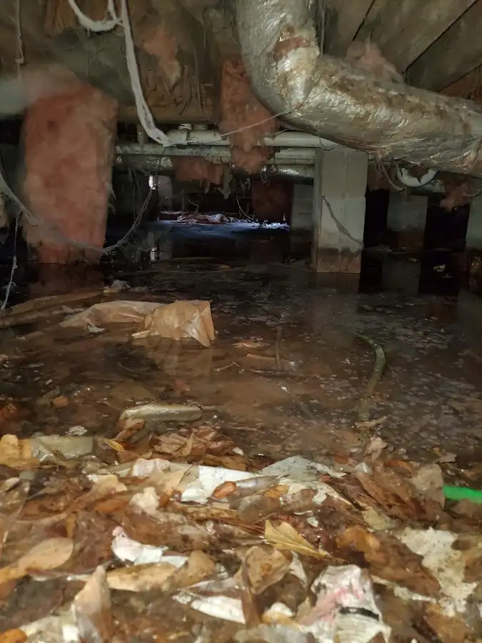 Crawl space flood assessment for Commercial Water Damage Restoration in Lower Oxford